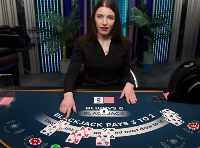 An always 6 blackjack live table with the fixed 6 at the dealer spot, a face-down dealer card and the Blackjack Pays 3 to 2 felt