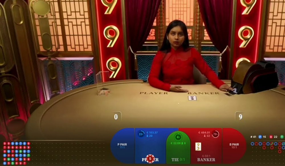 An always 9 baccarat live table with the Banker on 9 before the deal and bet spots for P Pair 11:1, Tie 9:1, Banker 0.56:1 and B Pair 10:1