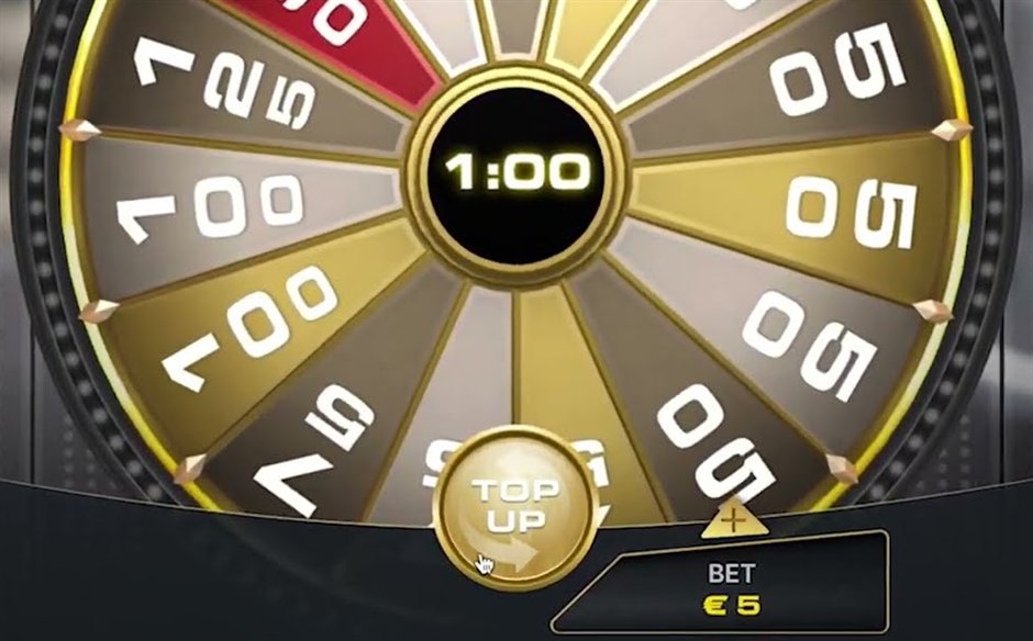 The deal or no deal live Top Up wheel with its cash values around a one minute timer and the Top Up button