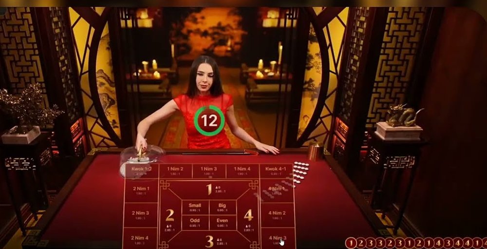 The fan tan live advanced betting grid showing the numbers 1 to 4, Small, Big, Odd and Even and the Nim and Kwok bet spots