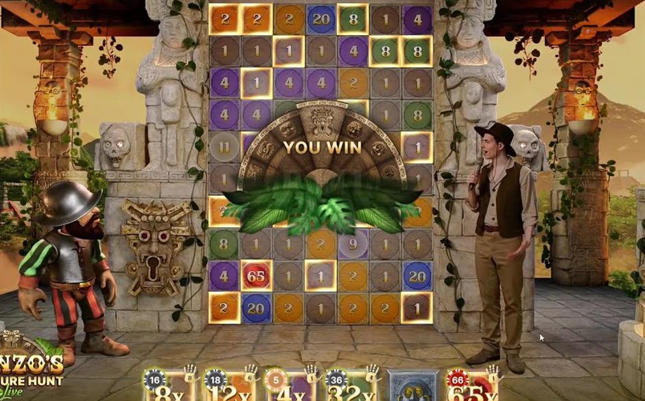The gonzos treasure hunt live wall of 70 stones showing 1x to 65x values beside Gonzo and the live host in the temple studio