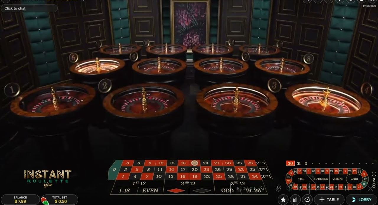An instant roulette live screen with the twelve automated wheels above the European betting layout and racetrack