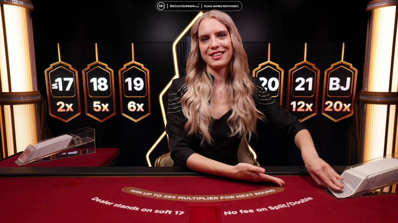 A lightning blackjack live dealer with the score boards above the table showing multipliers for 17, 18, 19, 20, 21 and blackjack