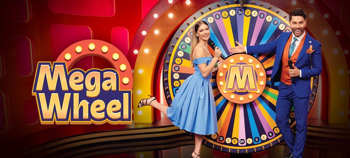 Mega Wheel Live launch art from Pragmatic Play with the Mega Wheel logo, the numbered money wheel and two game hosts