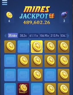 A mines grid from a different supplier showing coin tiles, one mine and a multiplier ladder above the board