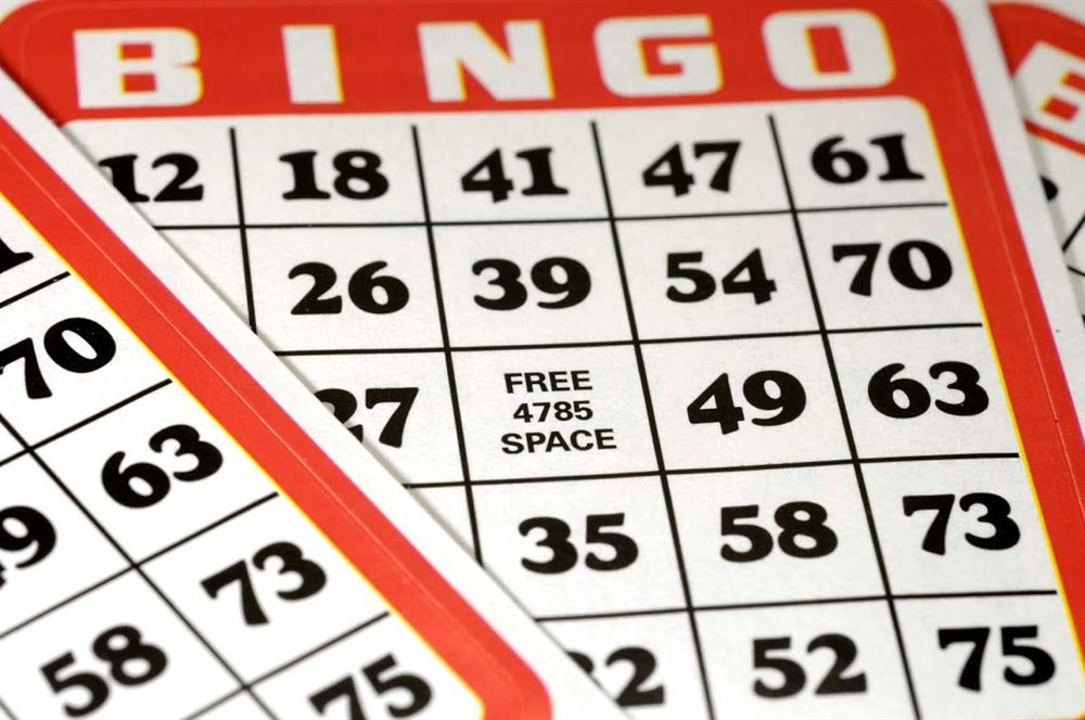 Red bingo card with B-I-N-G-O columns and a free space, the layout behind the bingo terms Canada players learn first