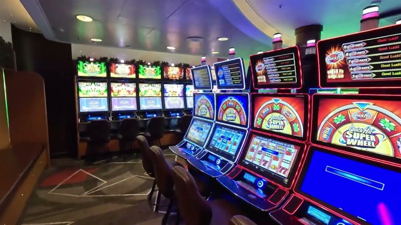 Row of slot machines in the casino of a Princess cruise ship