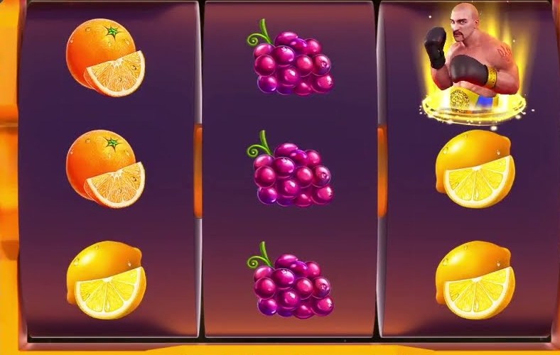 King of the Ring reels with oranges, grapes, lemons and the boxer symbol on reel three