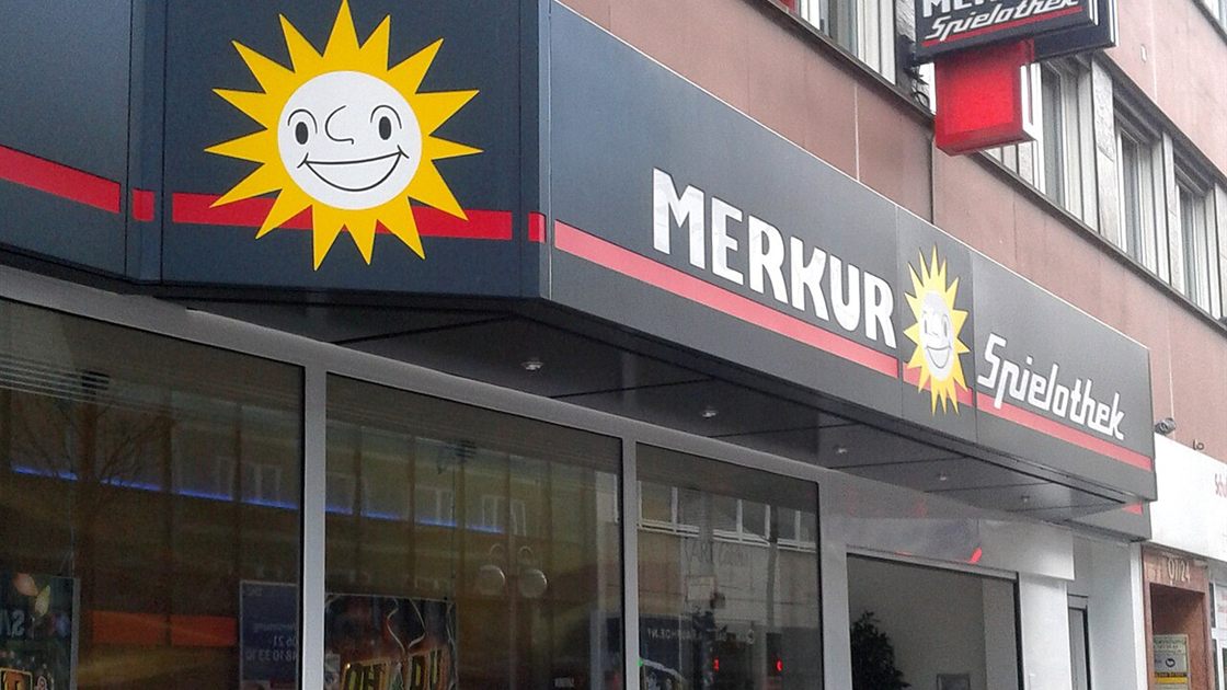 Merkur Spielothek arcade front with the smiling sun logo, the land-based roots of Merkur casinos Canada players find online