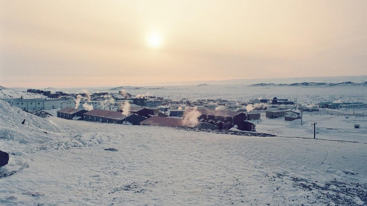 Iqaluit in winter under a low Arctic sun