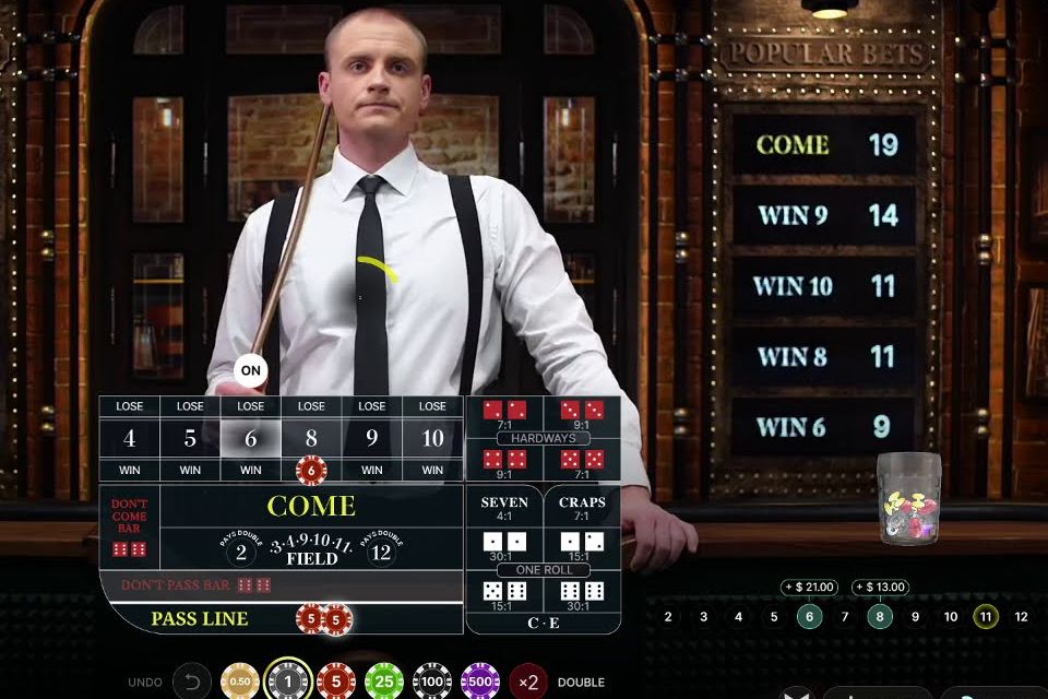 Craps Live layout with chips on the Pass Line and a Place bet on the eight
