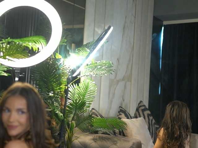 A RoyalCams live room with a ring light and a studio set