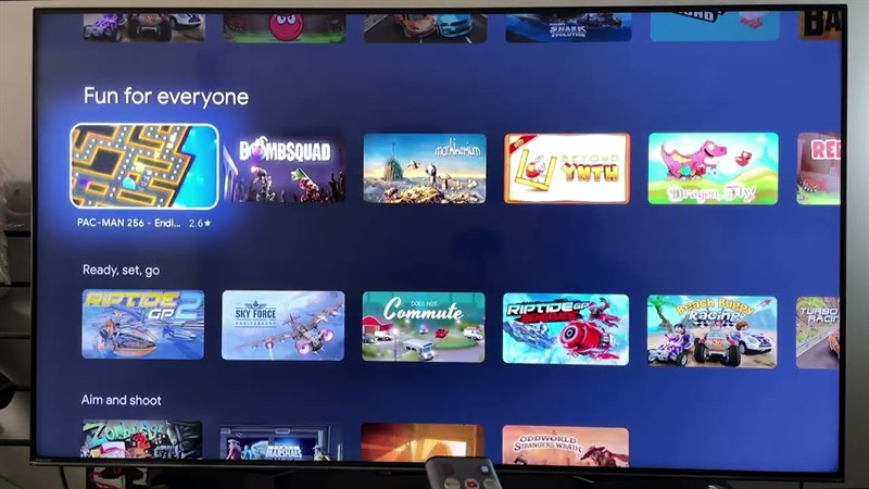 Google TV app store with game tiles on a smart TV screen