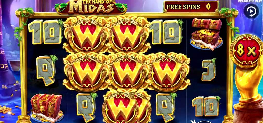 Wild symbols and an 8x multiplier hand on the Hand of Midas slot Canada reels during free spins